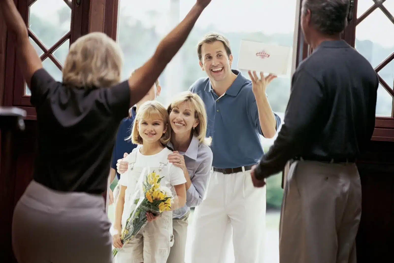 Family arriving to their grandparents house